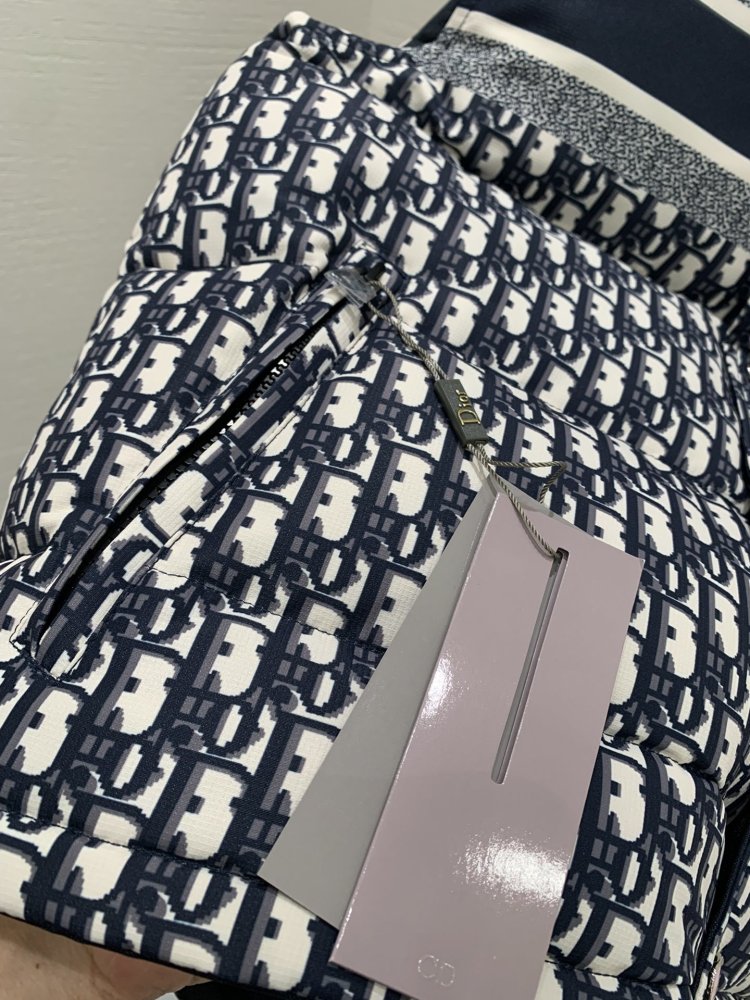 Жилетка на пуху женская фото 3