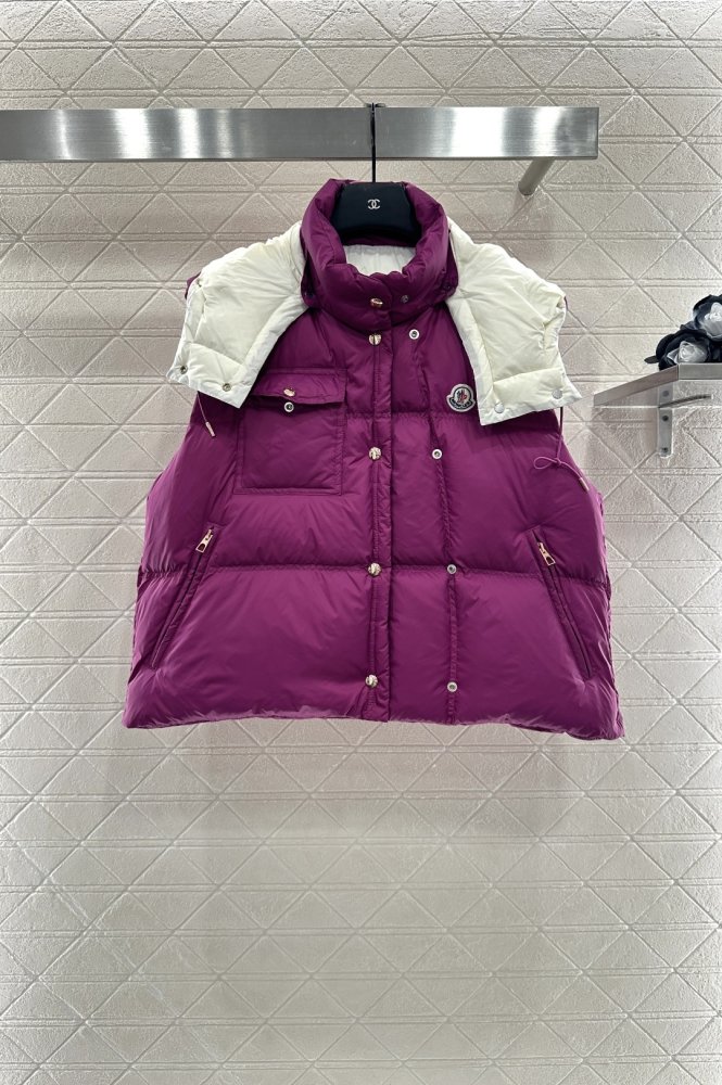 Жилетка на пуху женская фото 3