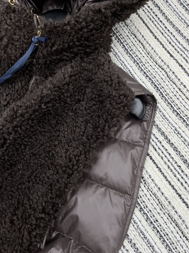 Жилетка на пуху женская фото 3