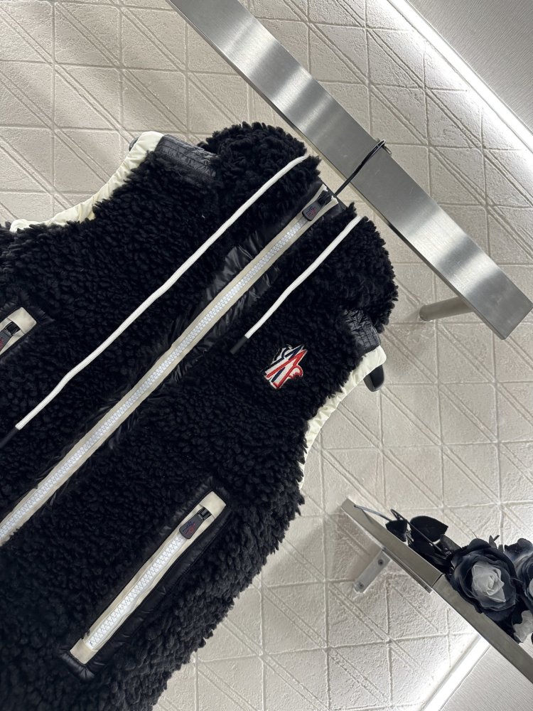 Жилетка на пуху женская фото 3