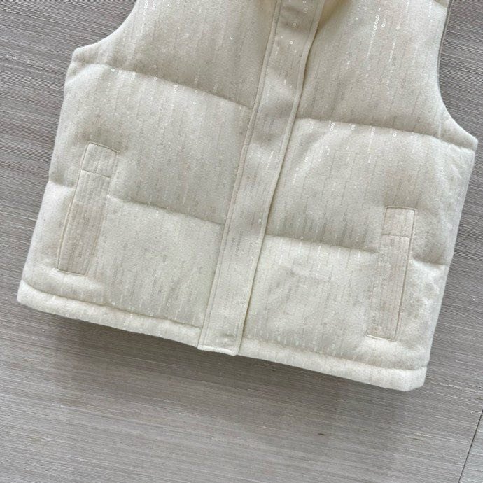 Жилетка на пуху женская фото 3