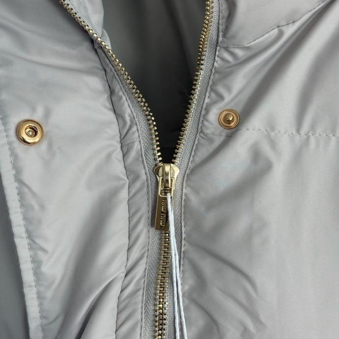 Жилетка на пуху жіноча фото 3