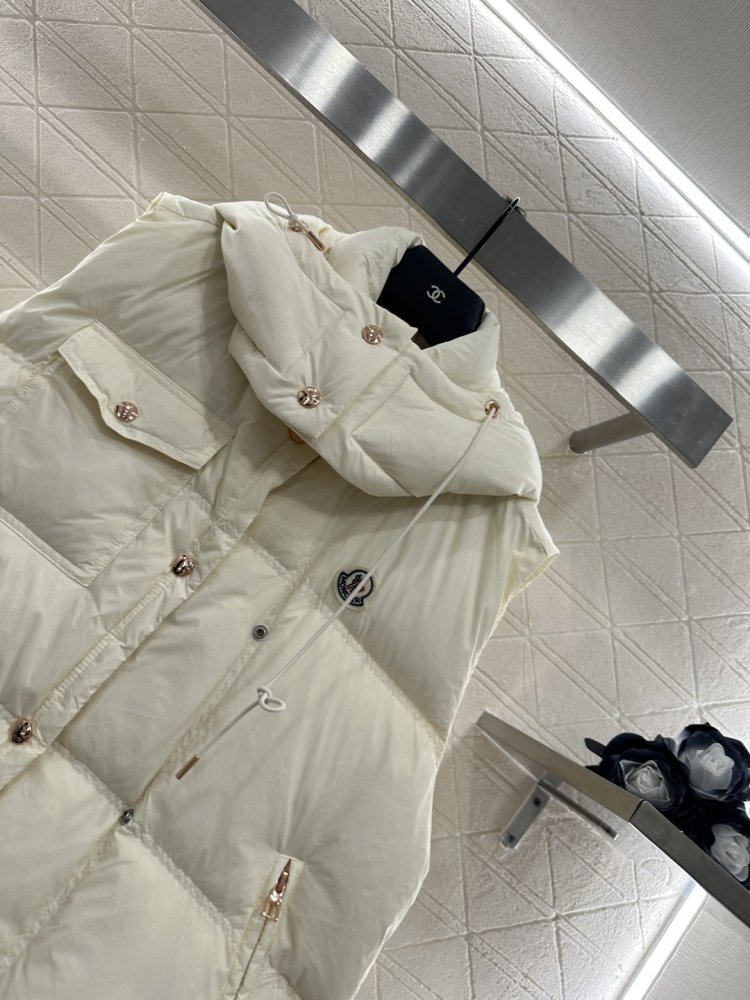 Жилетка на пуху женская фото 4