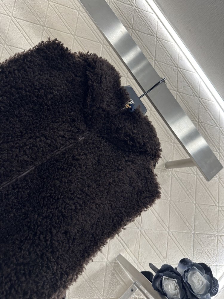 Жилетка на пуху женская фото 4