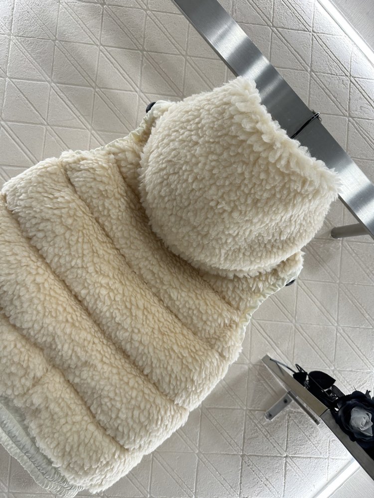 Жилетка на пуху женская фото 4