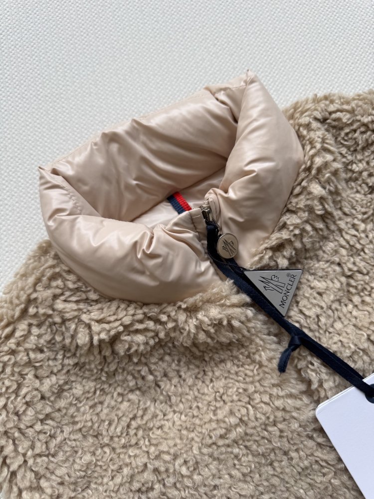 Жилетка на пуху женская фото 4