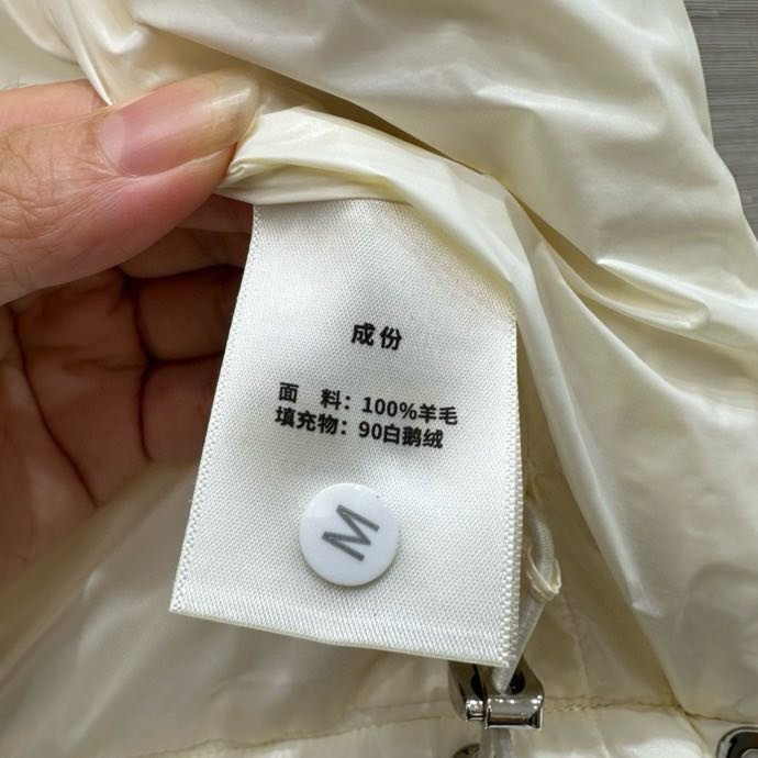 Жилетка на пуху женская фото 4