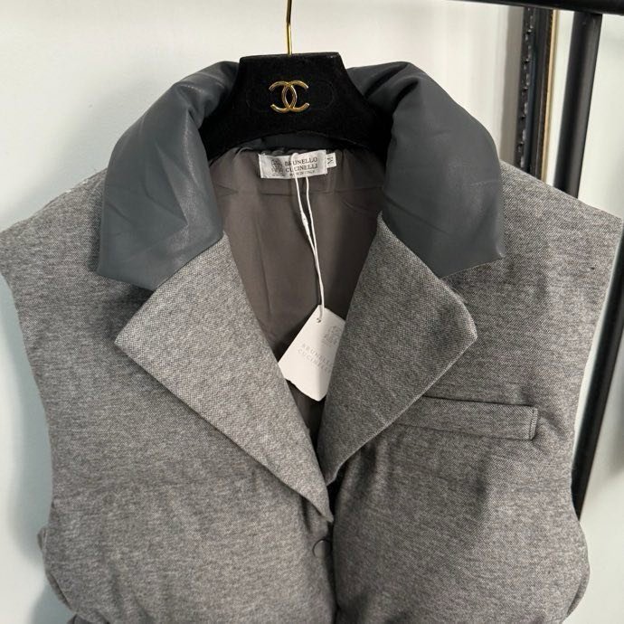 Жилетка на пуху женская фото 4