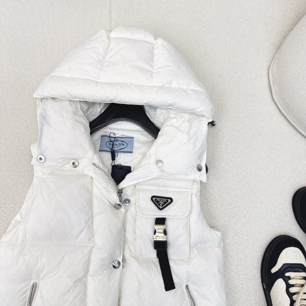 Жилетка на пуху женская фото 5