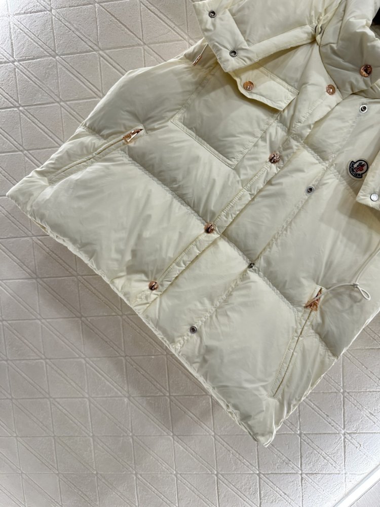 Жилетка на пуху женская фото 5