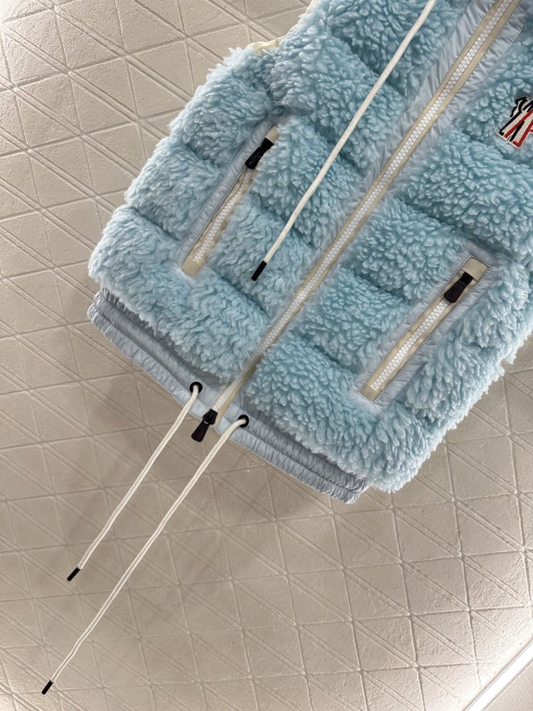 Жилетка на пуху женская фото 5