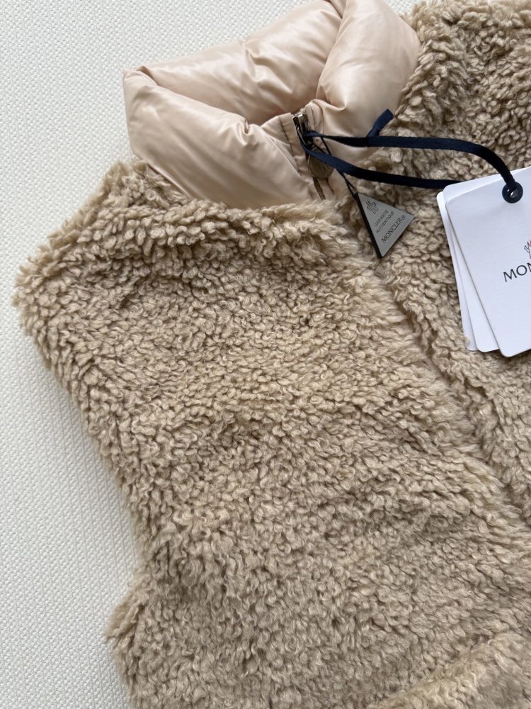 Жилетка на пуху женская фото 5