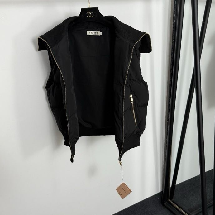 Жилетка на пуху женская фото 5