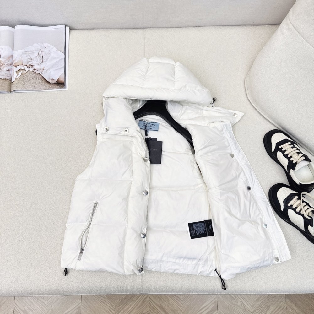 Жилетка на пуху женская фото 6