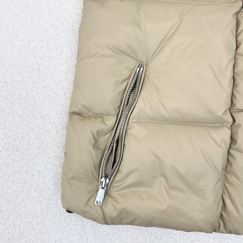 Жилетка на пуху женская фото 6