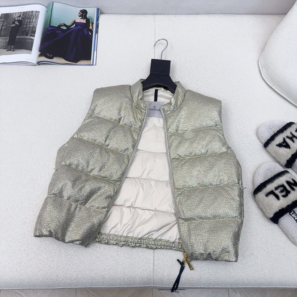 Жилетка на пуху женская фото 6