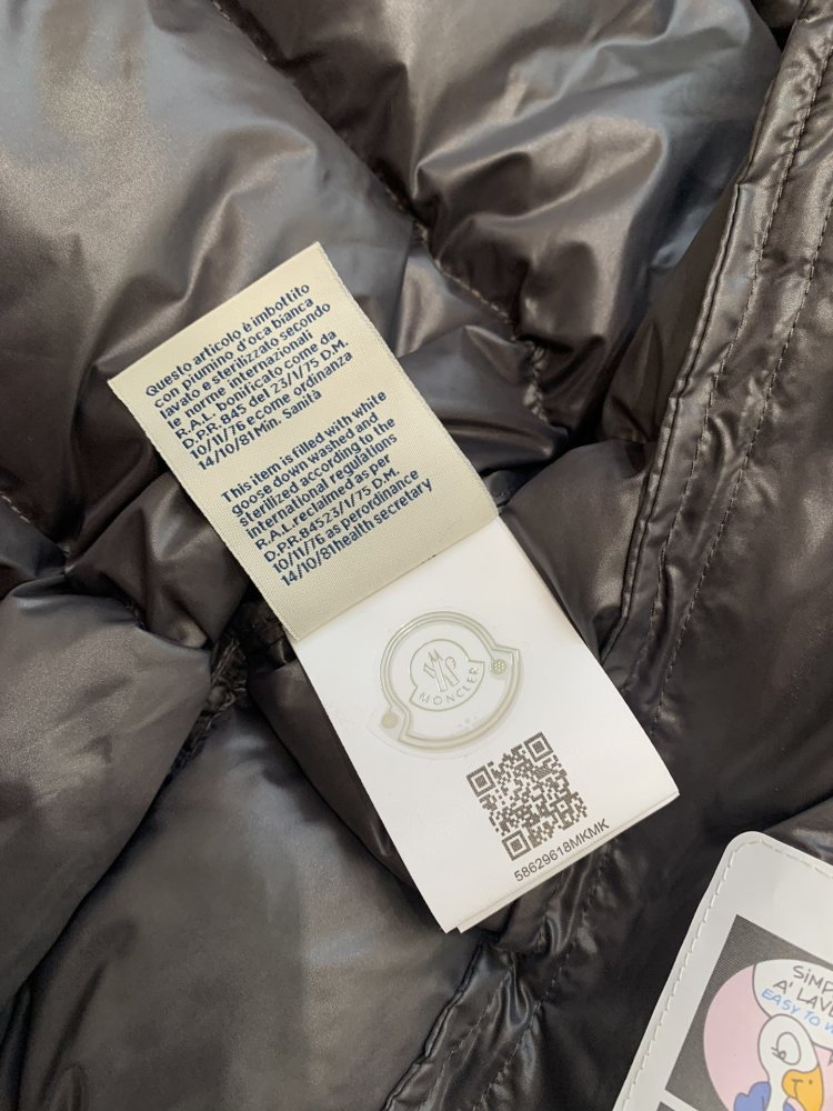 Жилетка на пуху жіноча фото 6