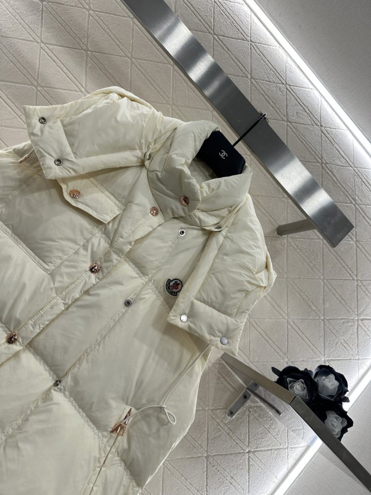 Жилетка на пуху женская фото 6