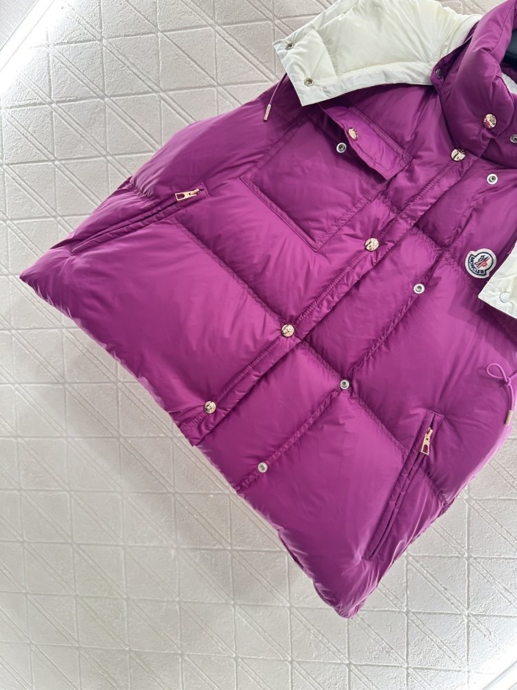 Жилетка на пуху женская фото 6