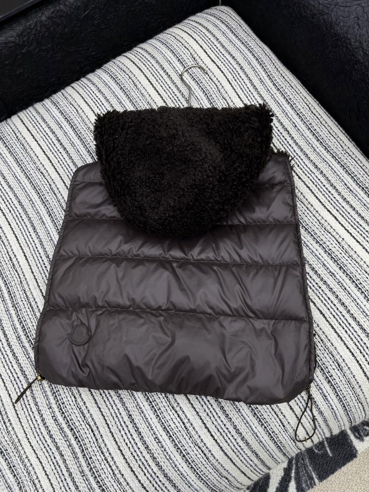 Жилетка на пуху женская фото 6