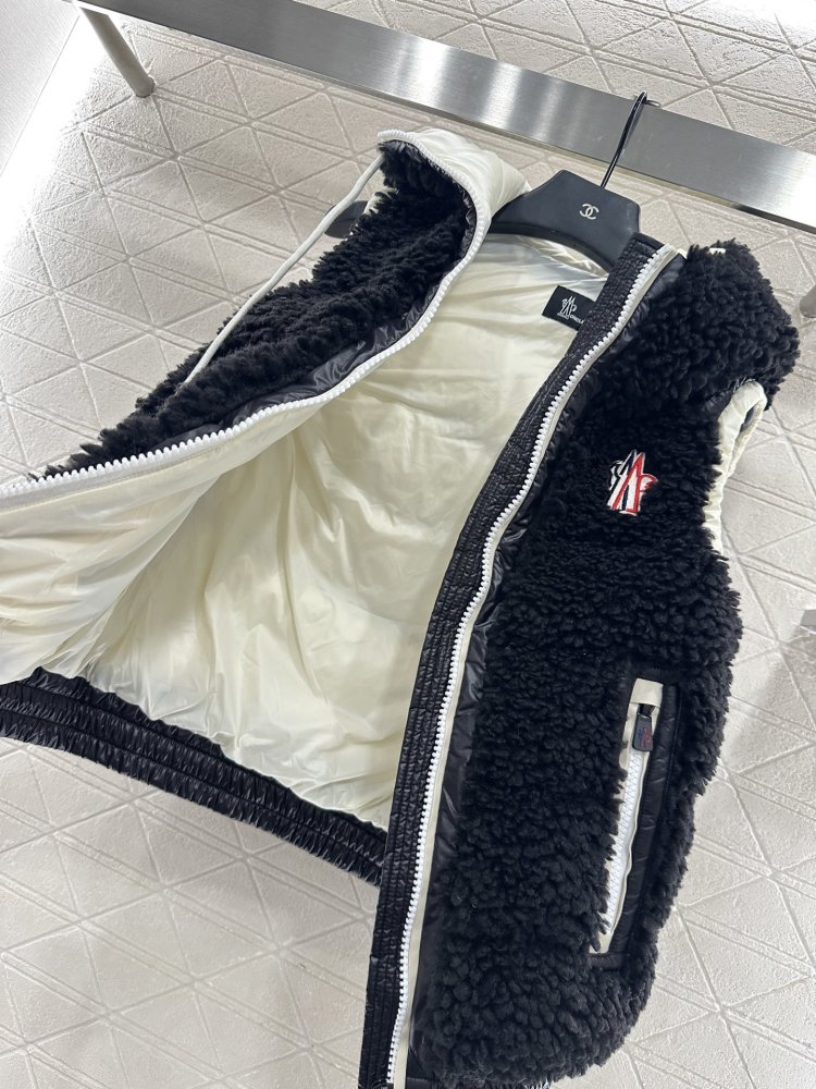 Жилетка на пуху женская фото 6