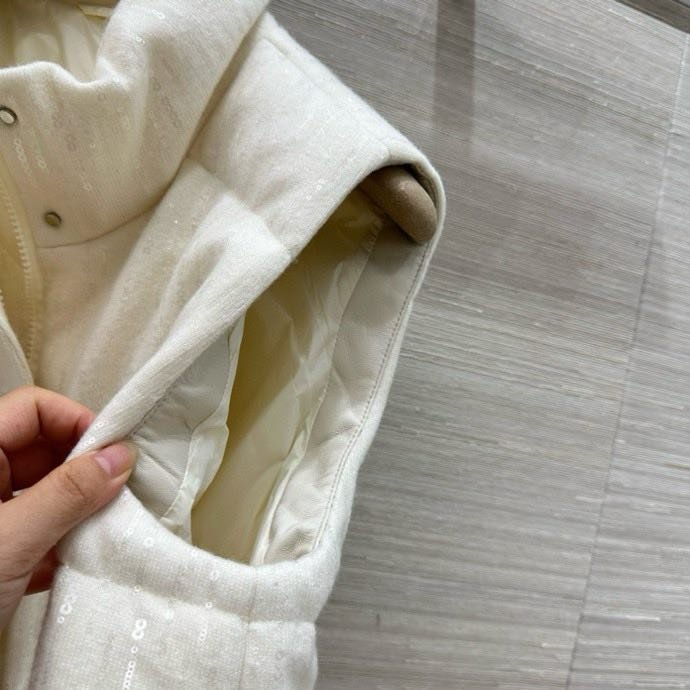 Жилетка на пуху женская фото 6