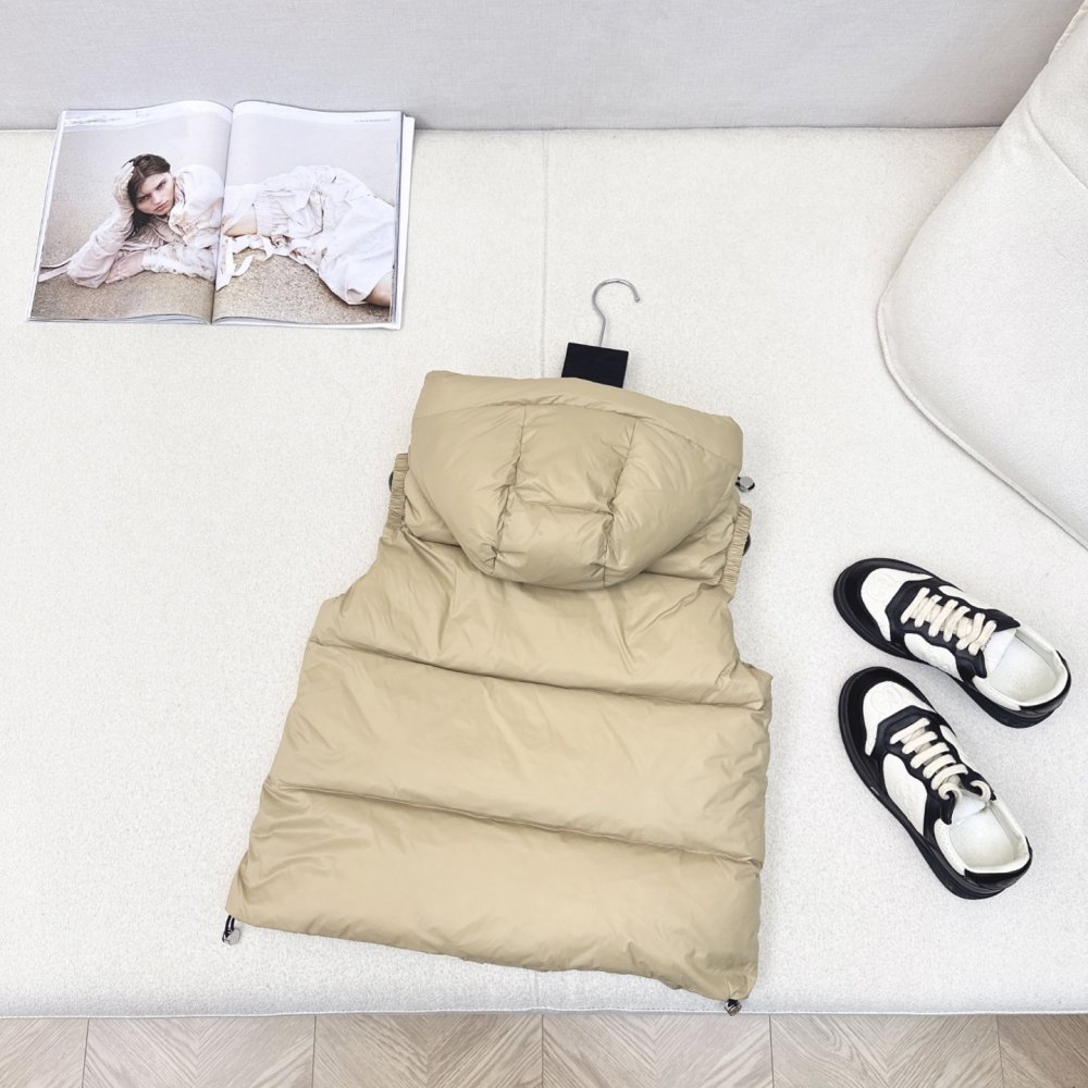 Жилетка на пуху женская фото 7