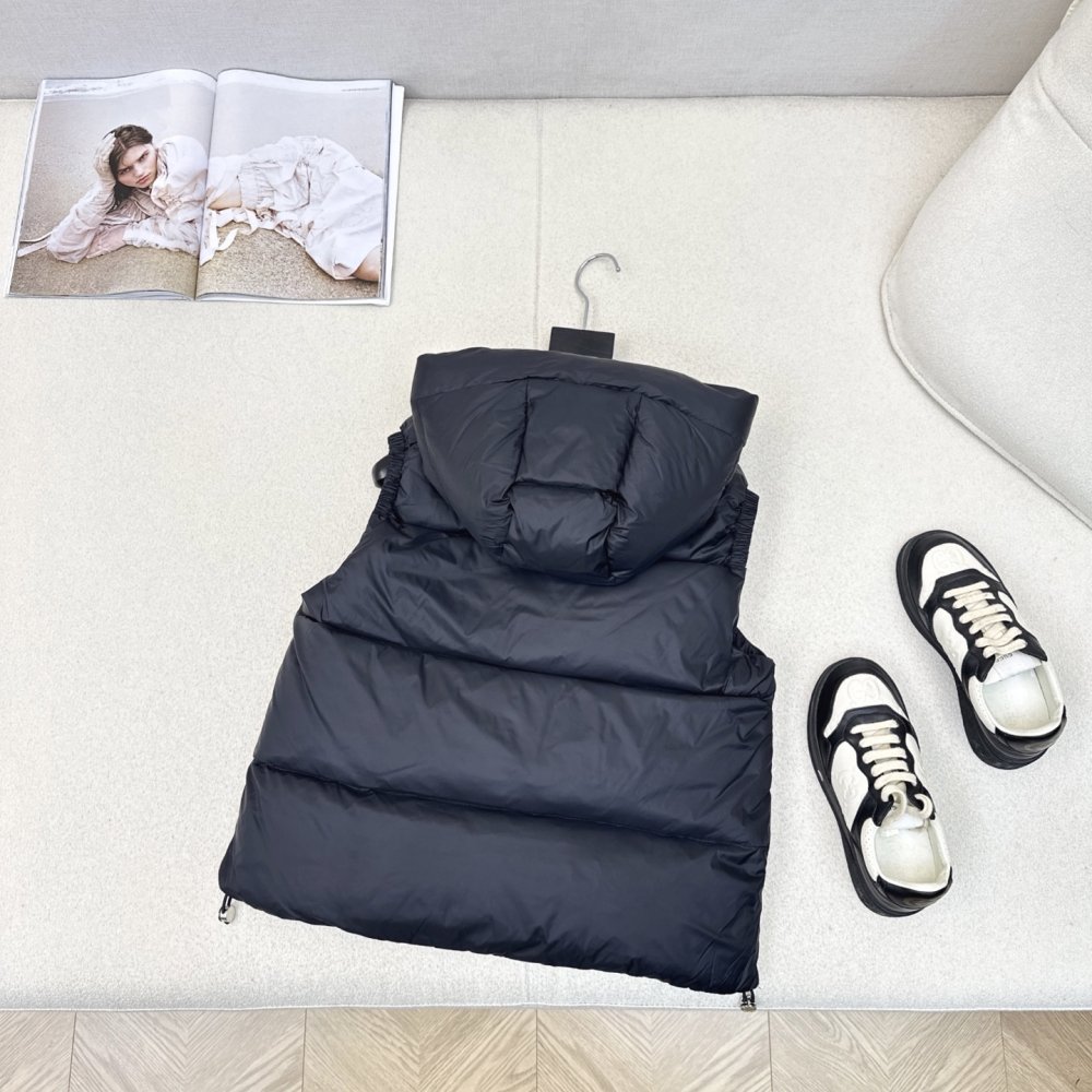 Жилетка на пуху жіноча фото 7