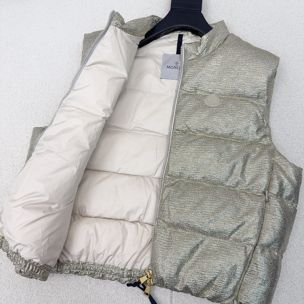 Жилетка на пуху женская фото 7