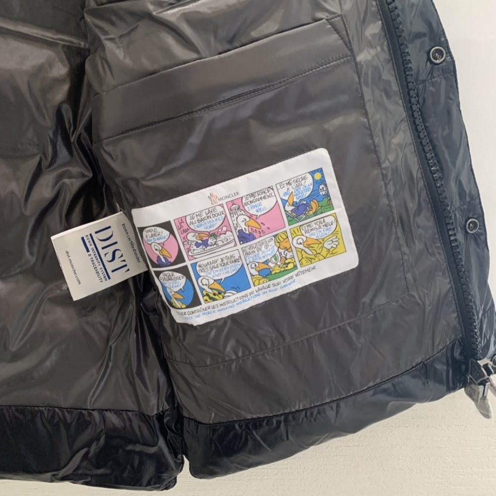 Жилетка на пуху жіноча фото 7