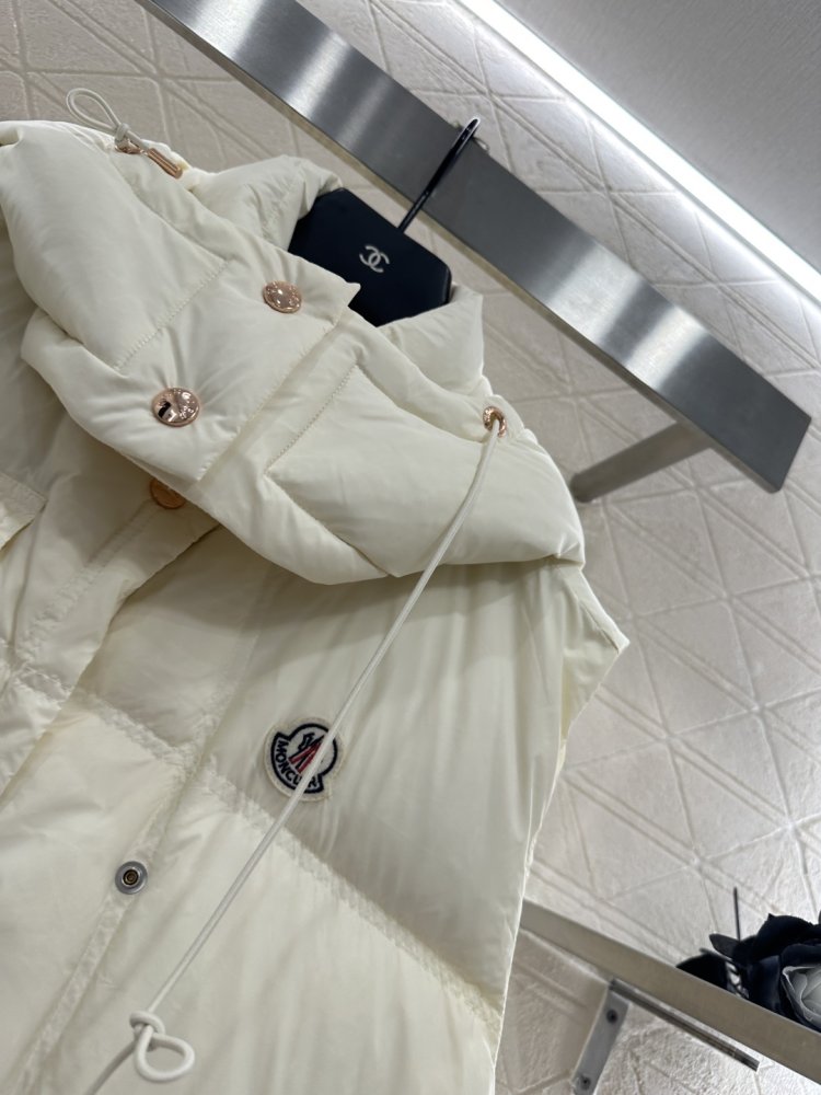 Жилетка на пуху женская фото 7