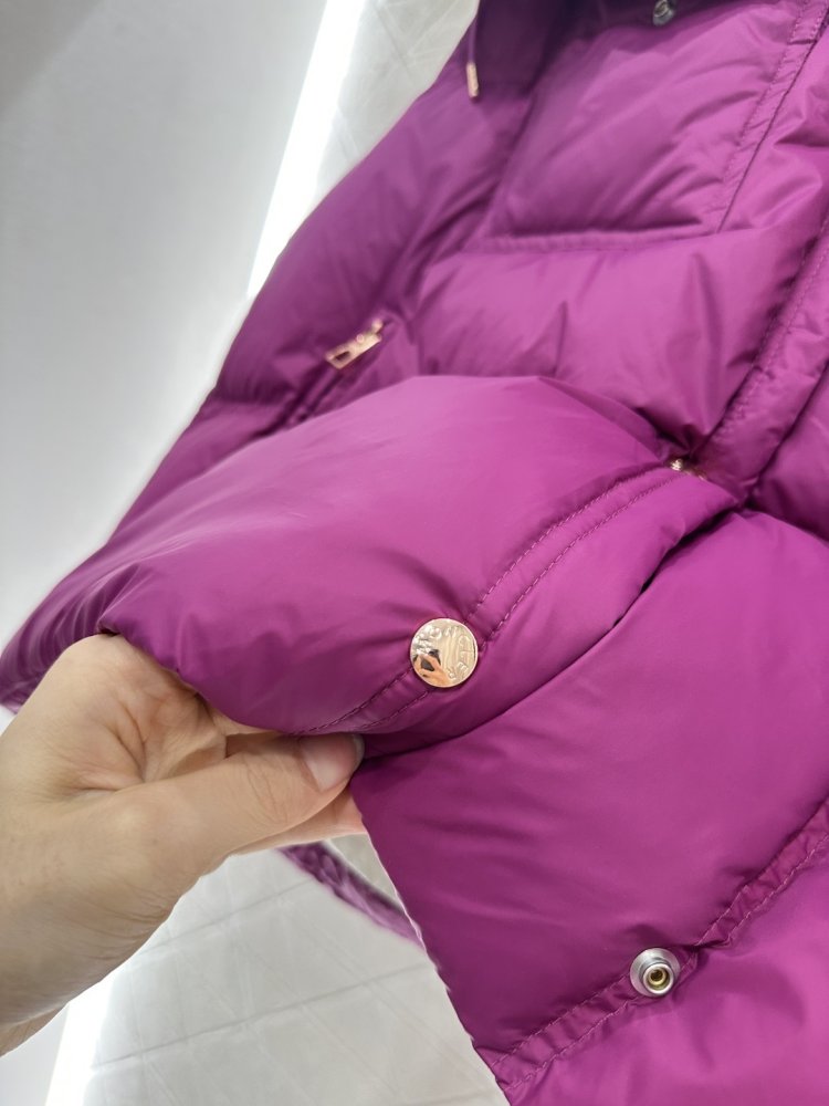 Жилетка на пуху женская фото 7