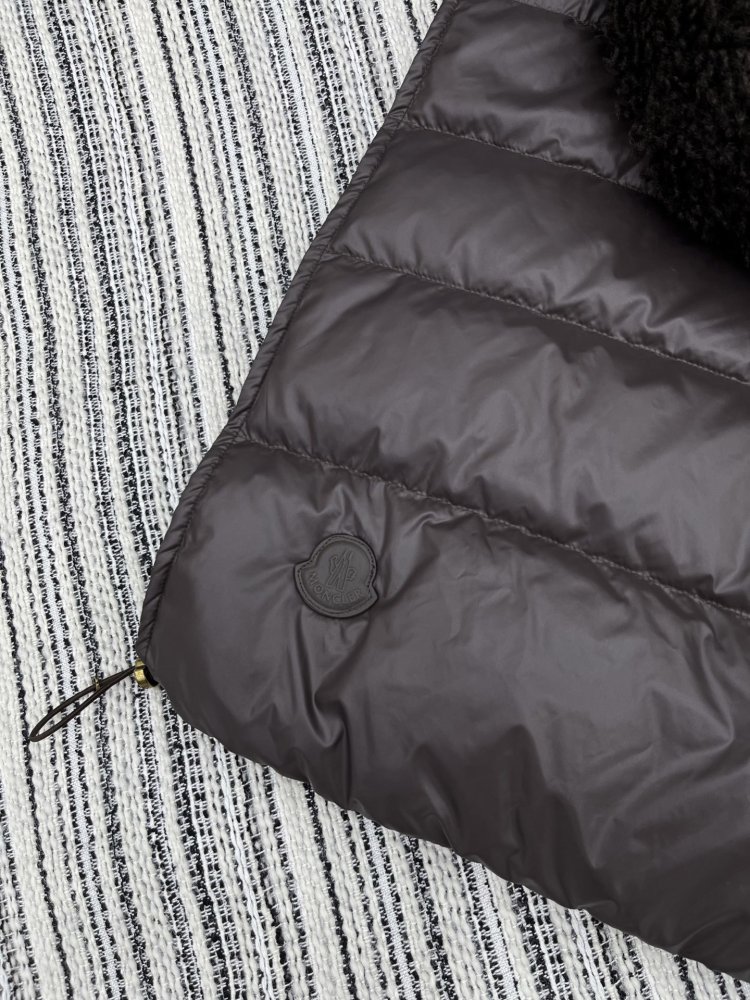 Жилетка на пуху женская фото 7