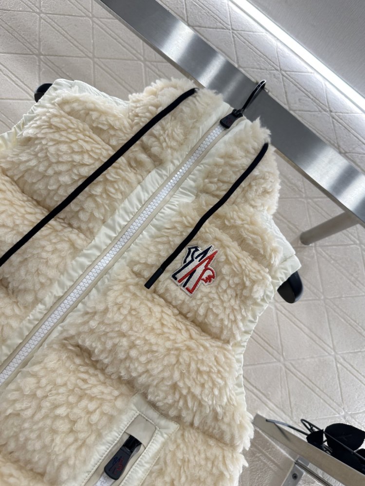 Жилетка на пуху женская фото 7