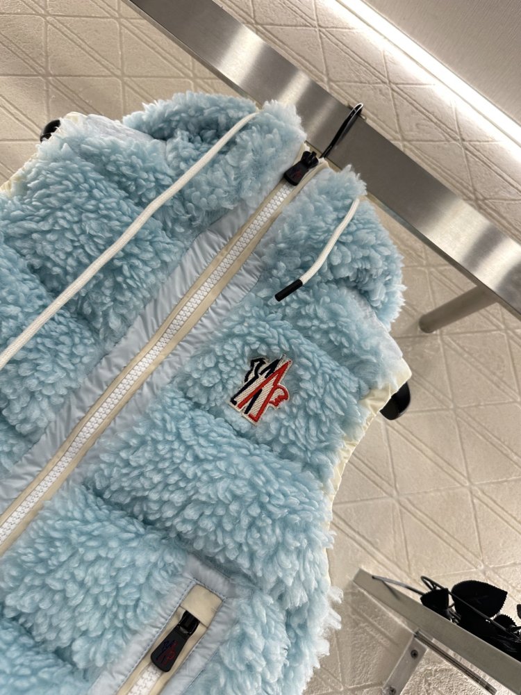 Жилетка на пуху женская фото 7