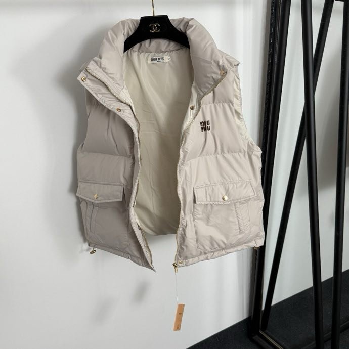 Жилетка на пуху жіноча фото 7