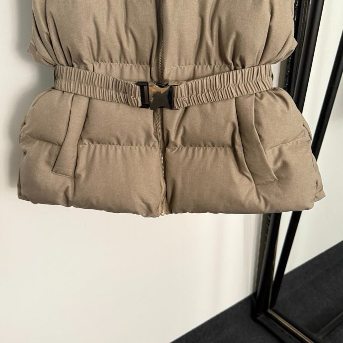 Жилетка на пуху женская фото 7