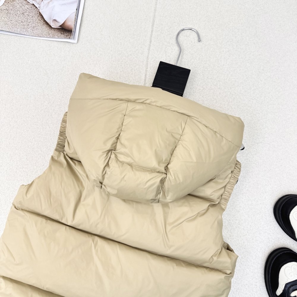 Жилетка на пуху женская фото 8