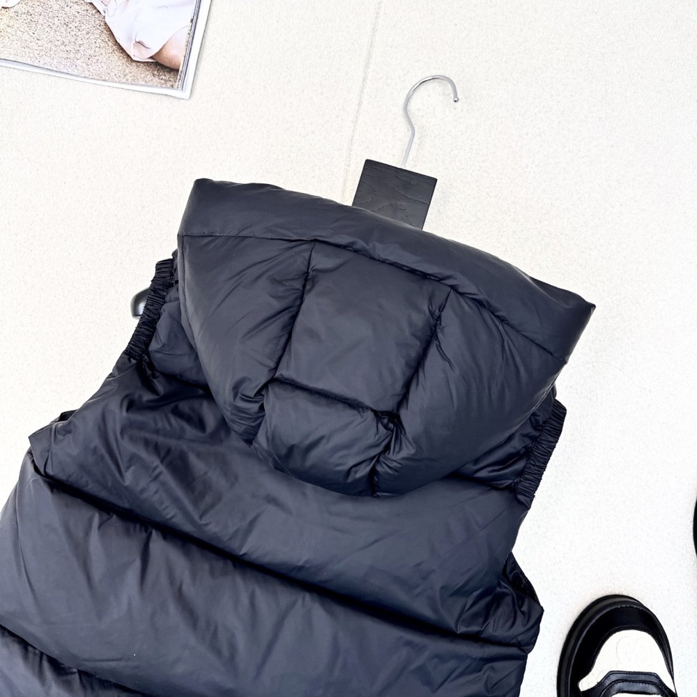 Жилетка на пуху жіноча фото 8