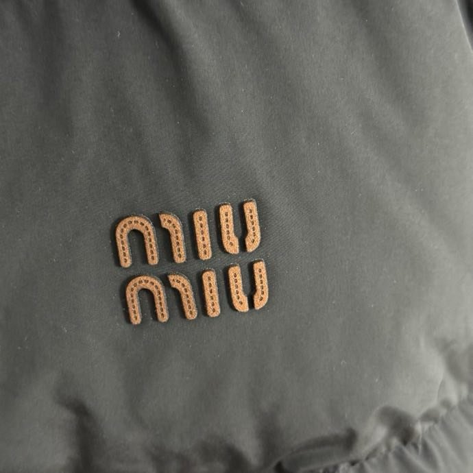 Жилетка на пуху женская фото 8