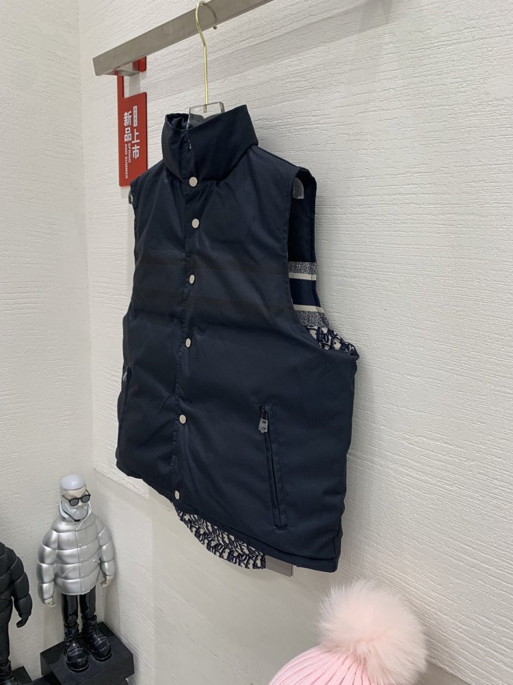 Жилетка на пуху женская фото 8