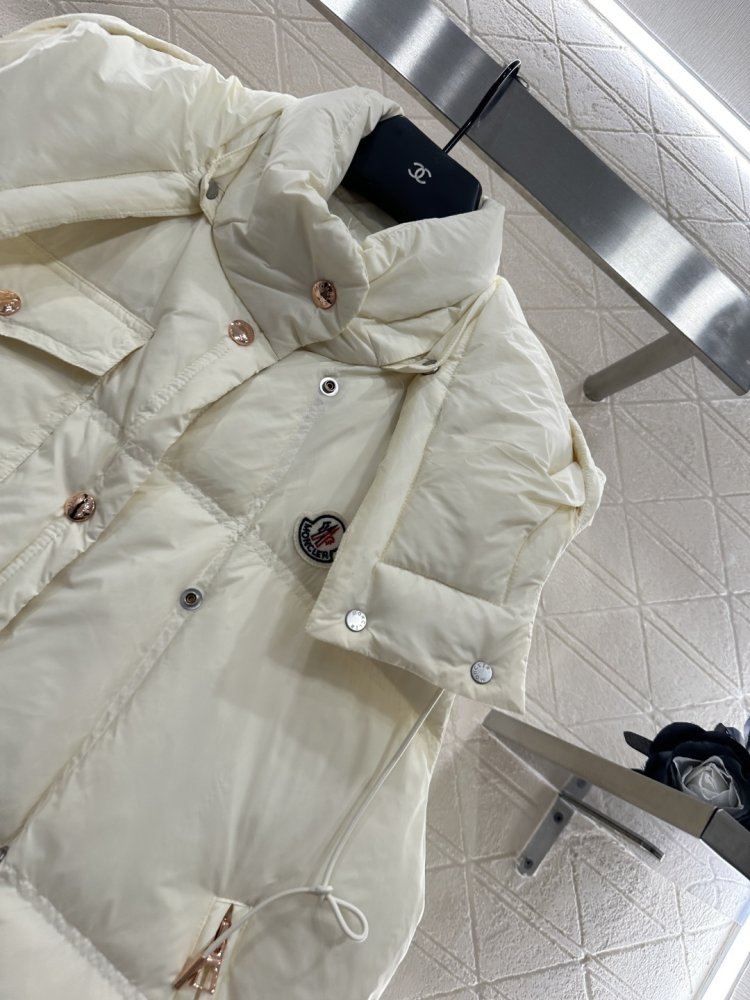 Жилетка на пуху женская фото 8