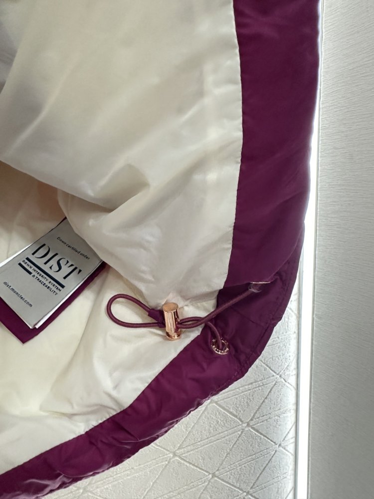 Жилетка на пуху женская фото 8