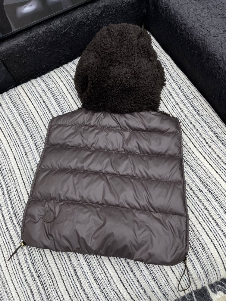 Жилетка на пуху женская фото 8