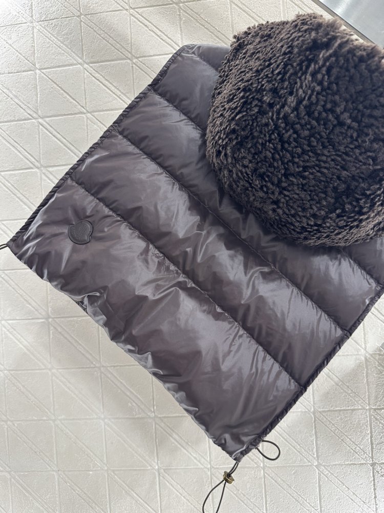 Жилетка на пуху женская фото 8