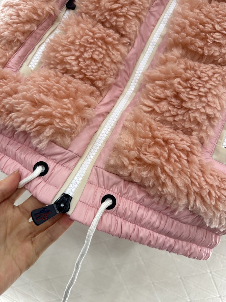 Жилетка на пуху жіноча фото 8