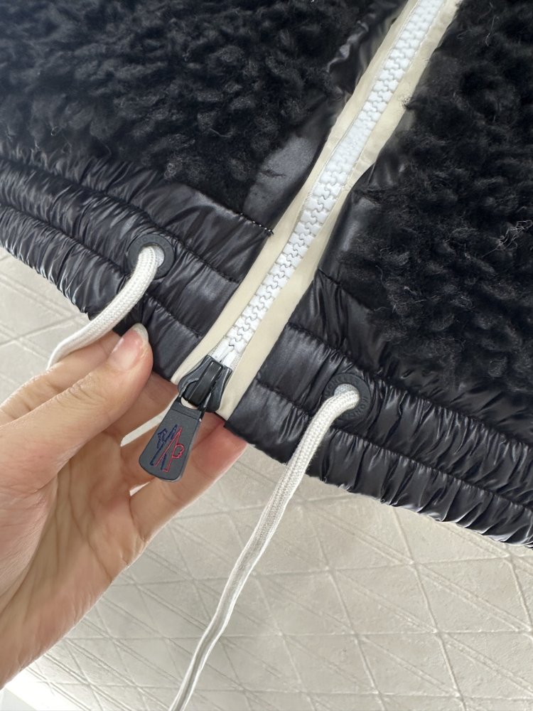 Жилетка на пуху женская фото 8