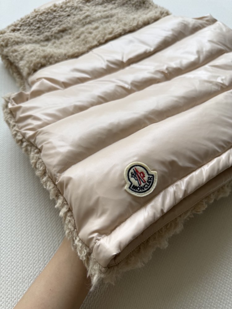 Жилетка на пуху женская фото 8