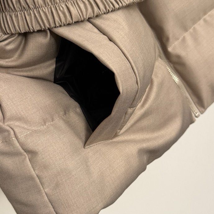 Жилетка на пуху женская фото 8