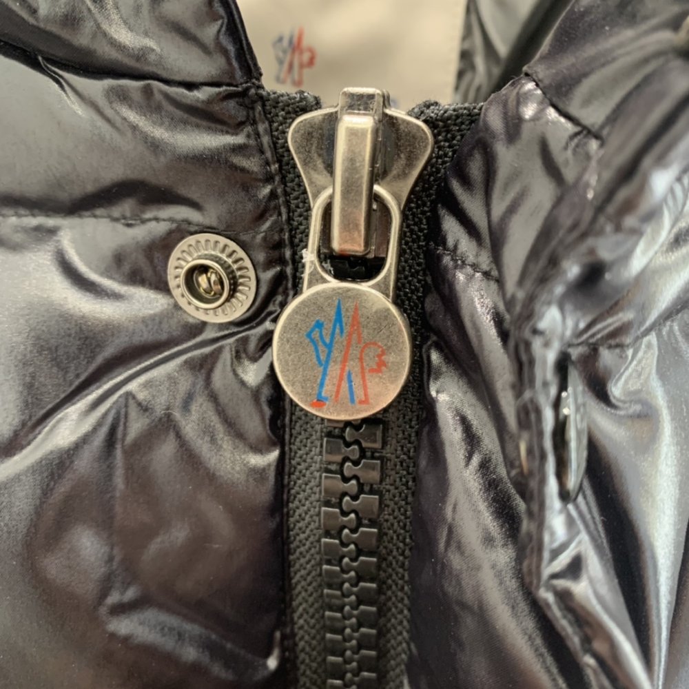 Жилетка на пуху жіноча фото 9